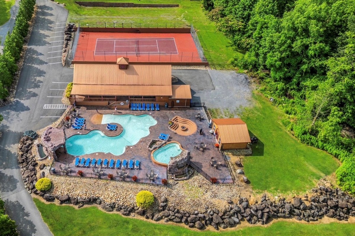 Resort with basketball, pickleball, tennis court, pools, hot tub, fire pit, and gym