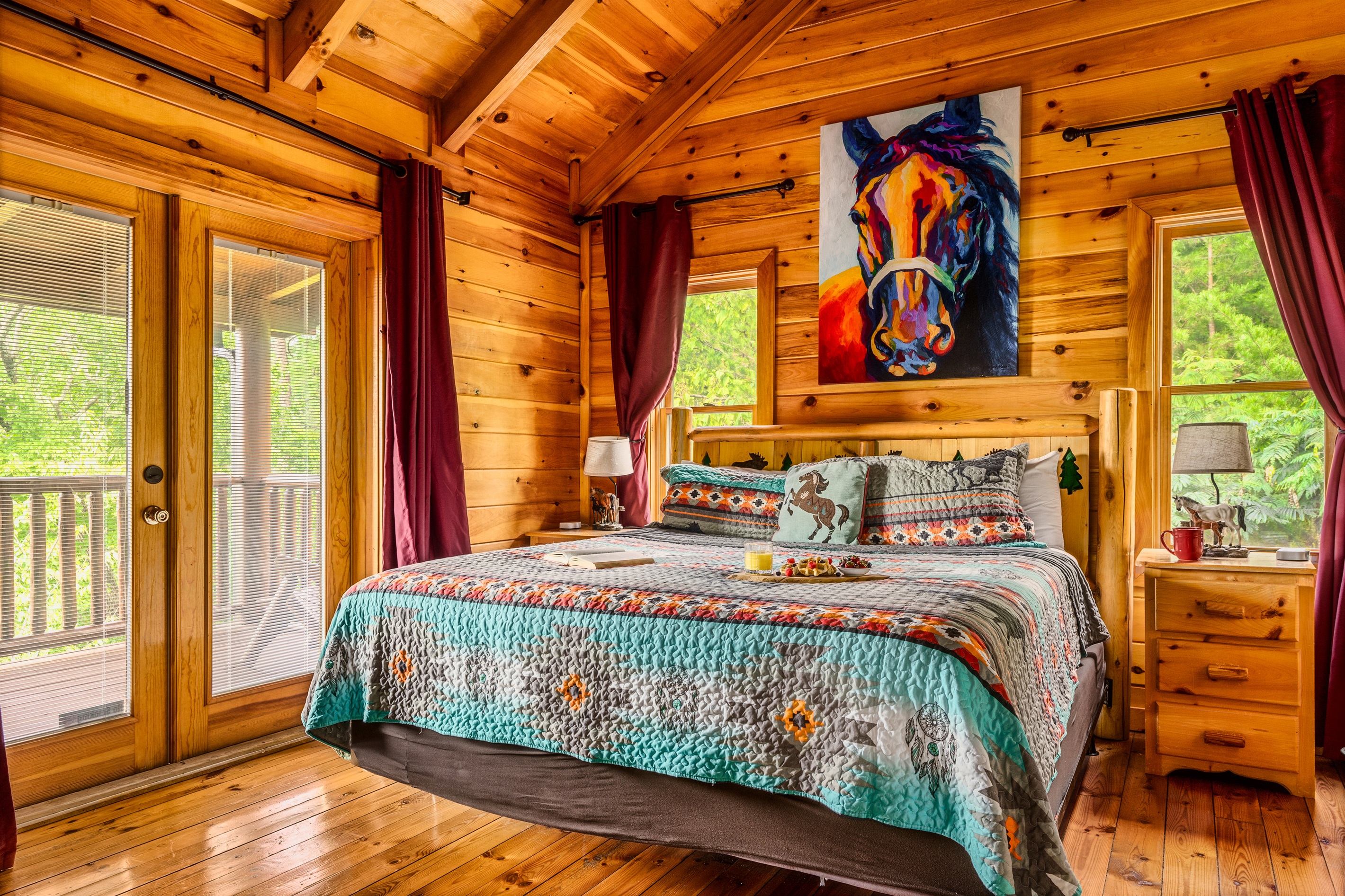 King bed, ensuite full bath, deck access.