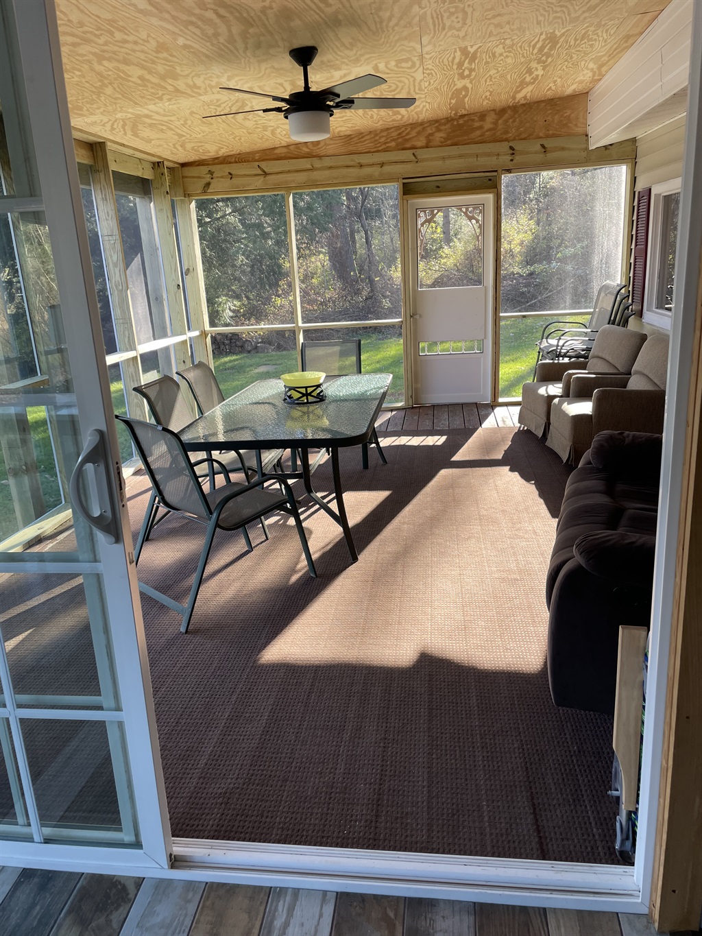 Nature's Hidden Treasure dining on the screened in porch.