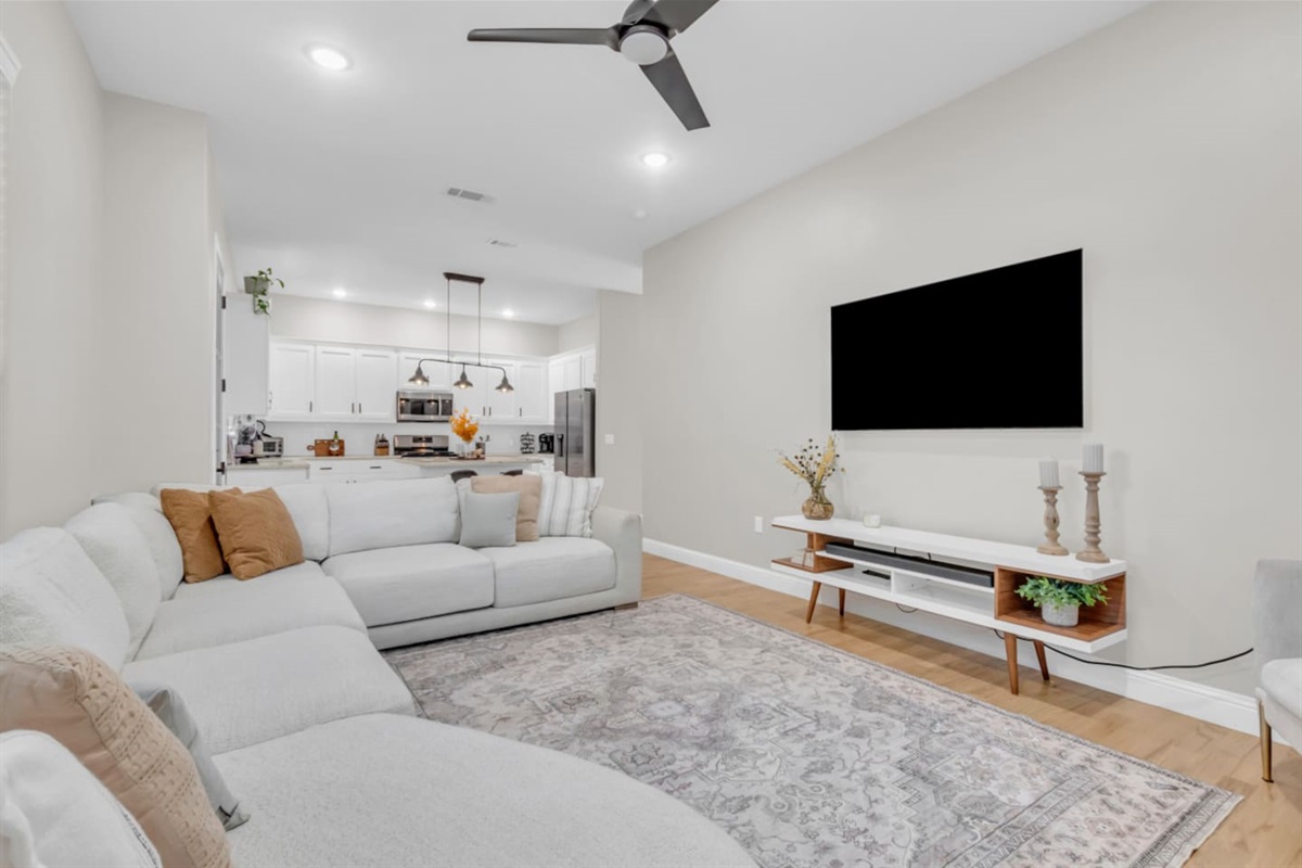 Bright living area with open shelving and chic décor.