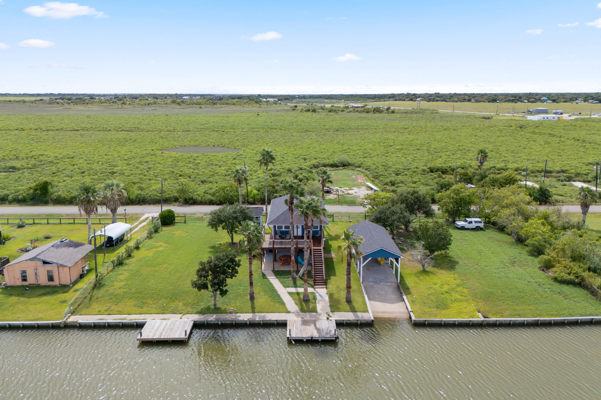 Ariel view of home and pier.