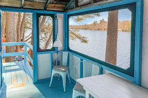 Indoor living with 2 chairs and 1 table"