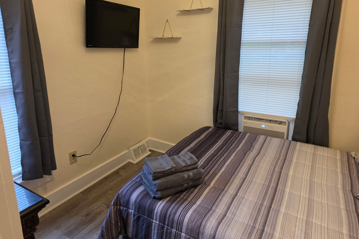 2 of 3 bedrooms on 2nd floor, all with Queen beds
