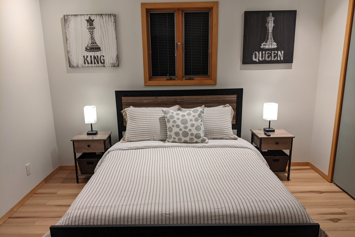 Queen-sized bed, fit for a King and Queen! Room has own split unit AC