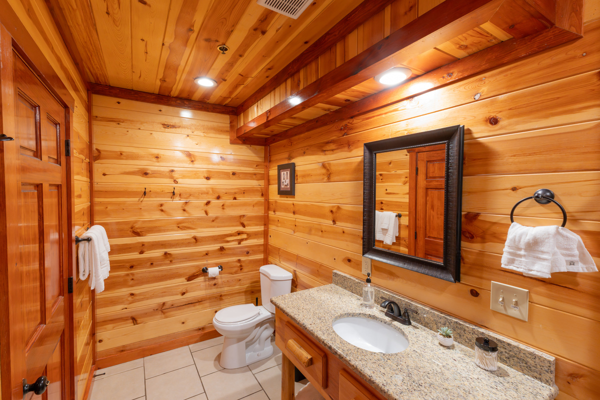 Enjoy a spa-inspired shared ensuite bathroom between the second and third king bedrooms, complete with a luxurious dual rainfall shower.