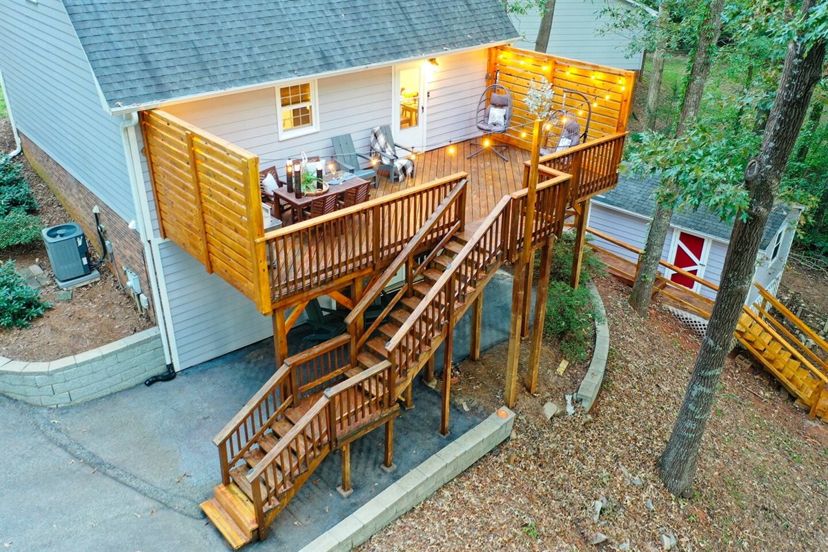 Access the private back deck with ample seating and a gorgeous ambiance you won't soon forget! 