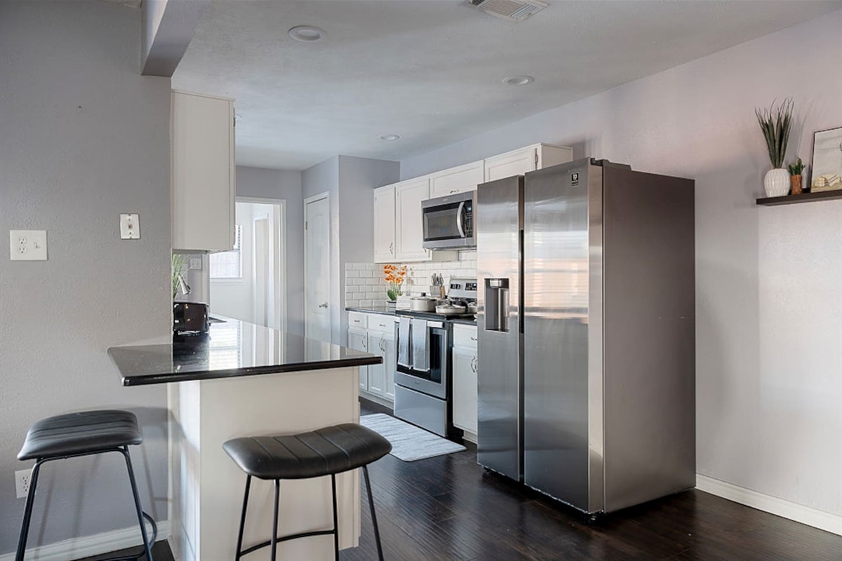 Enjoy the beautiful kitchen, fully-equipped with all your cooking needs such as spices, oil, pots, pans, dishes, silverware, a toaster and more