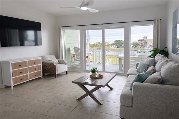 Sun-filled waterfront living space with private balcony