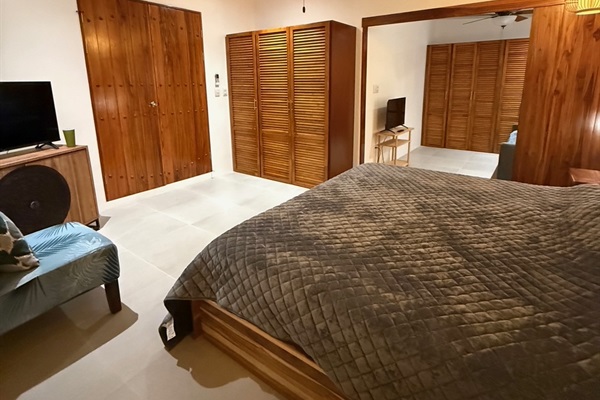 Bedroom 3 showing the barn doors open to the kid room/sitting room