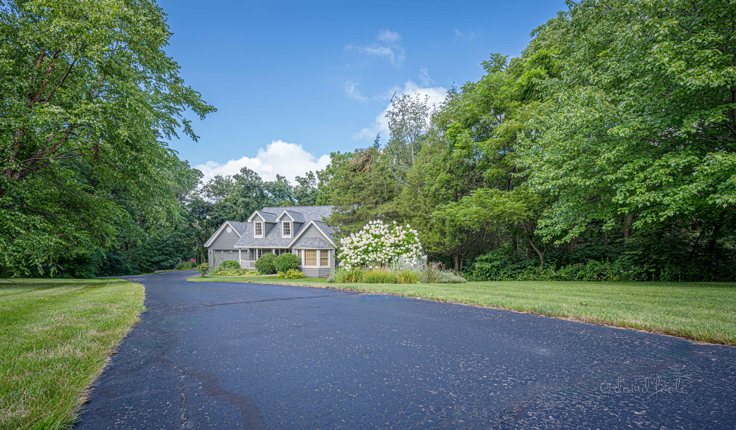 Front of home with yard