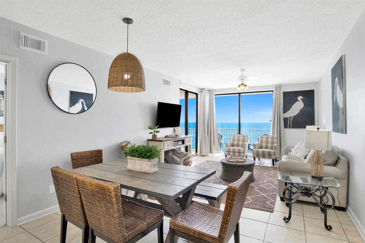 Look at that view! New new new - chairs, paintings, 50" smart TV, rug, coffee table. This condo is just begging for you to come and relax, with plenty of seating.