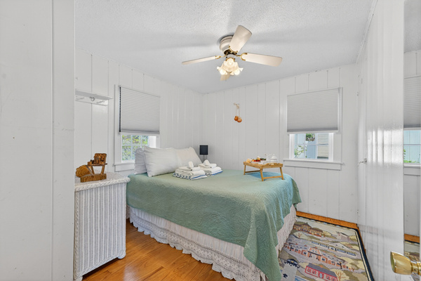 Primary bedroom featuring a full bed.
