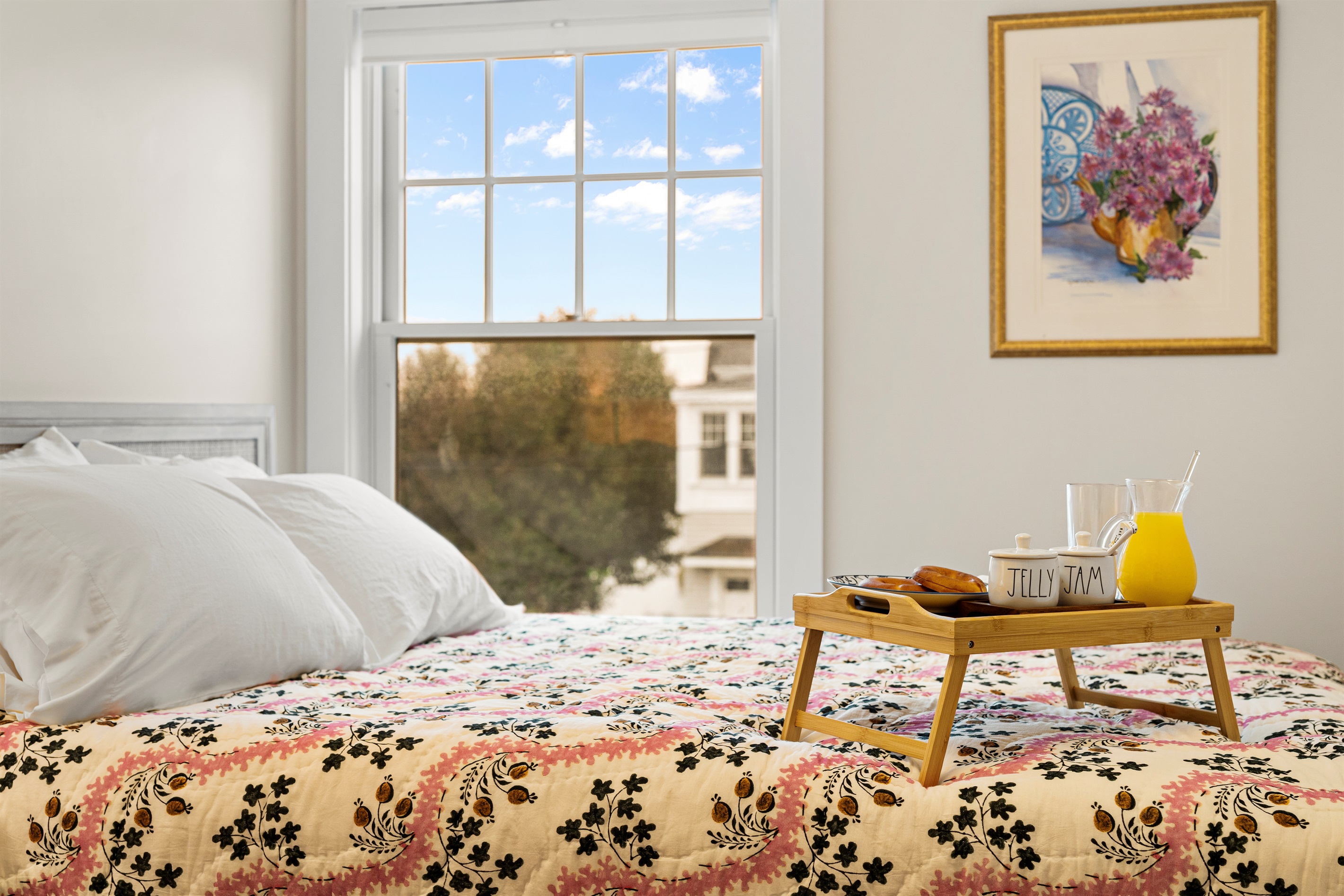 Comfort and calm await in the second bedroom with a queen bed and soft linens.