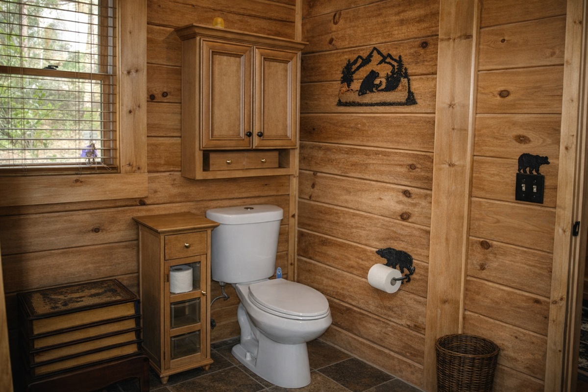 Full bathroom on the main level just off of Bedroom 1.