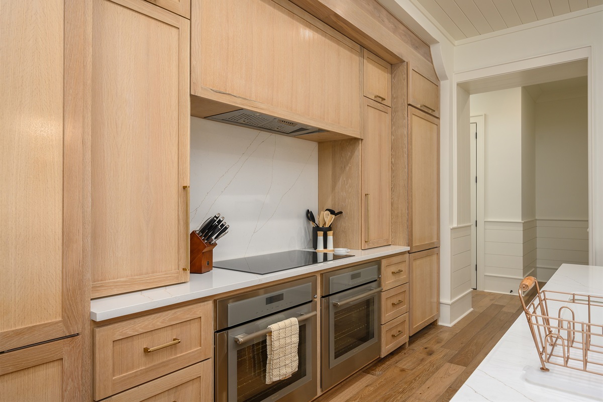 A gourmet kitchen featureing 2 Subzero fridges and two ovens