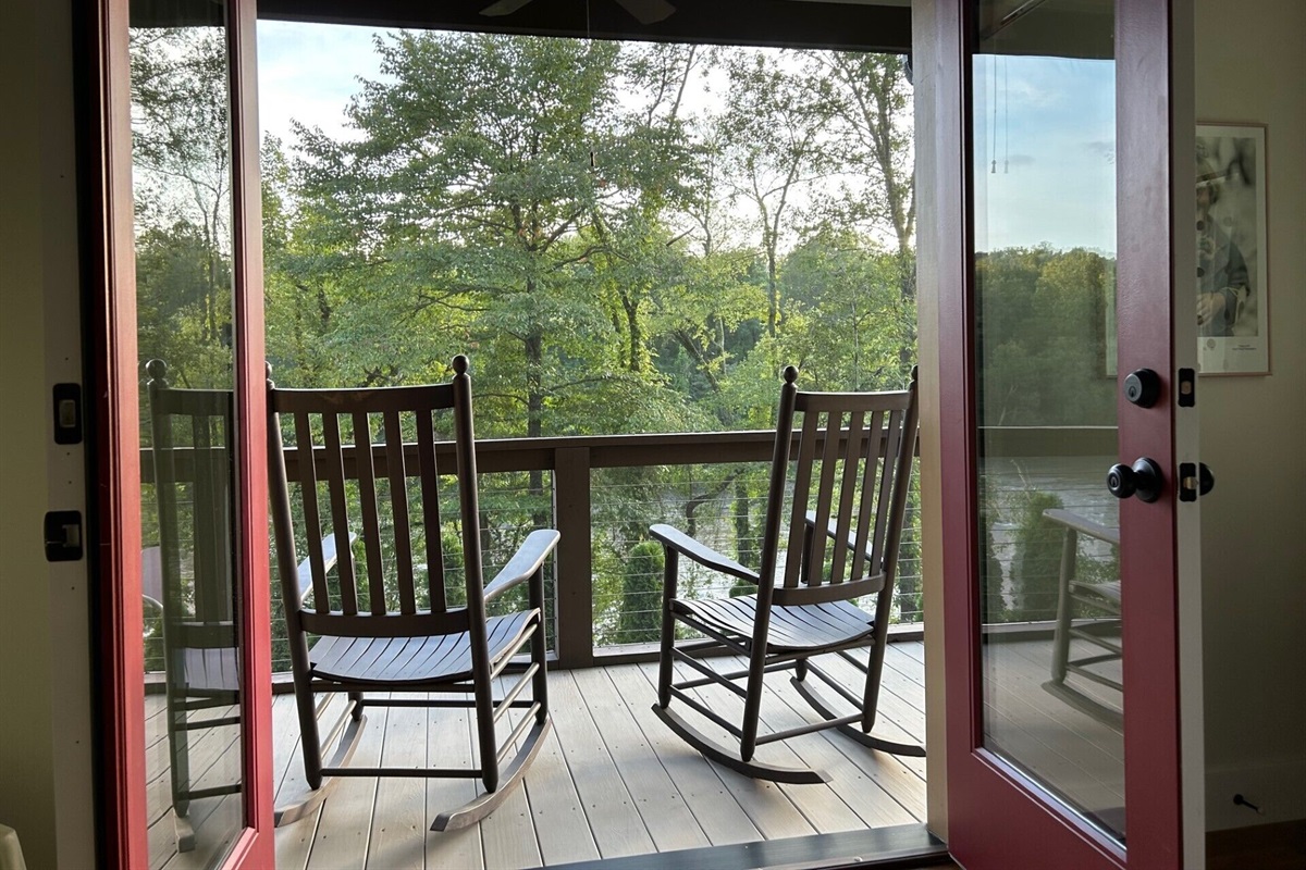 Throw the doors open to the porch and enjoy the breeze coming from the river