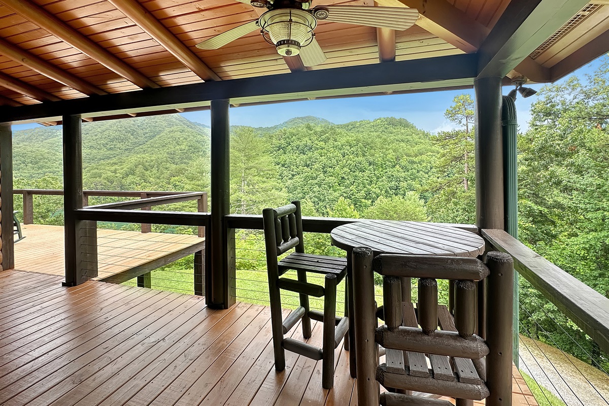 Covered Porch: Unwind with breathtaking mountain views from this charming outdoor retreat!