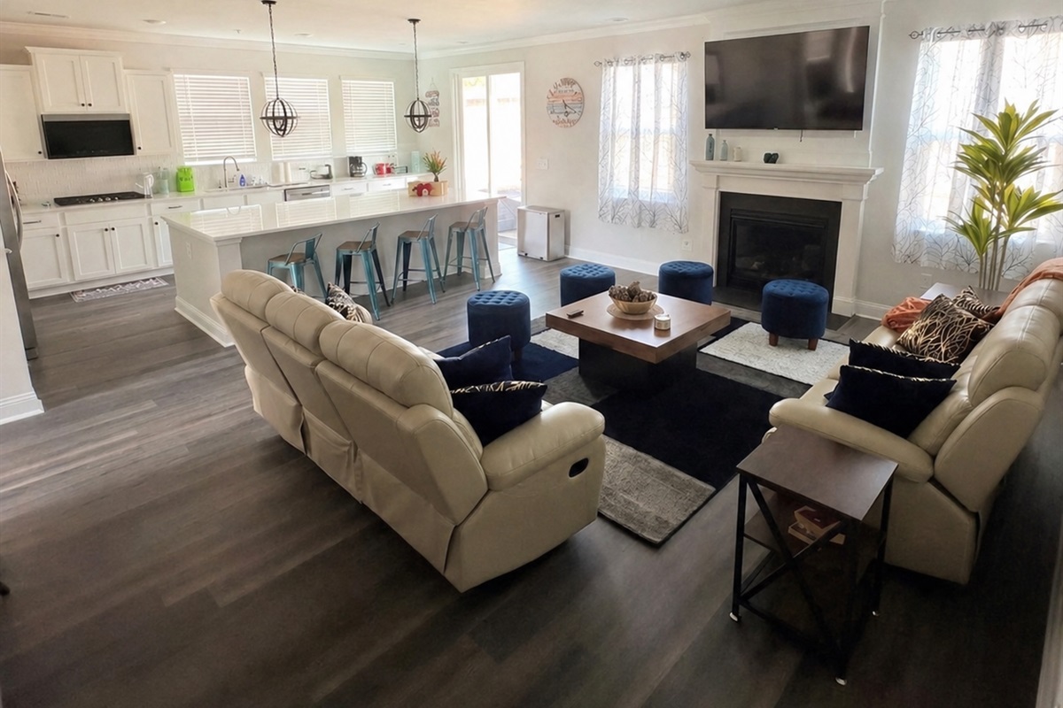 Living Room: Bright and airy space with comfy seating, perfect for laughter and memories!