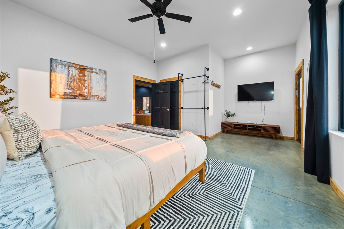 The simple yet polished design of this bedroom makes it easy to settle in and unwind.