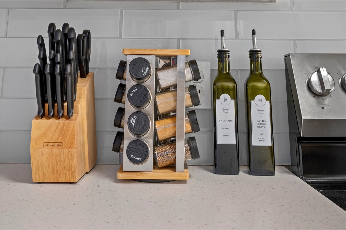 Create effortless family meals in a fully stocked kitchen with quality knives, spices, and premium olive oil and balsamic for beach snacks or relaxed dinners.