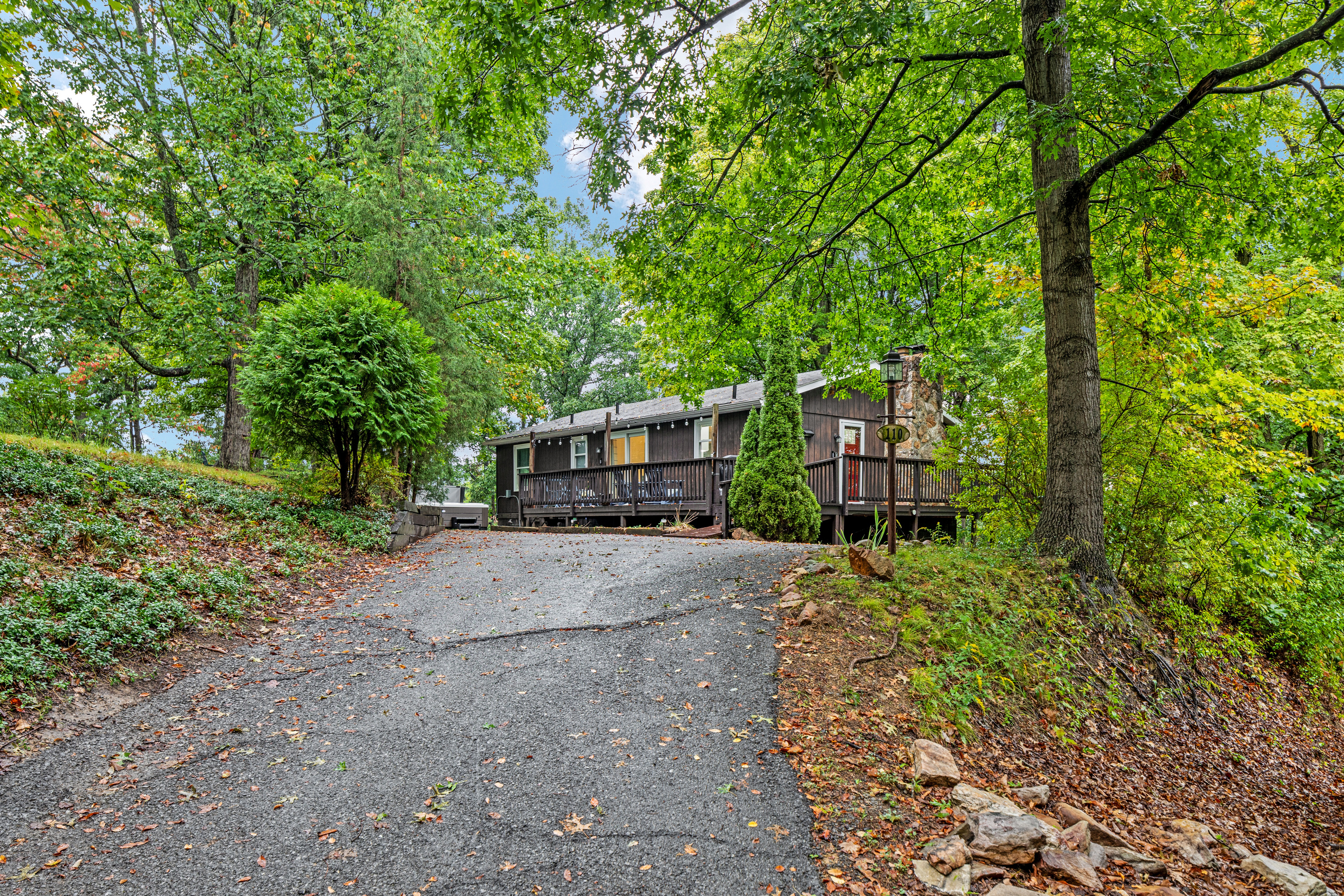 Tucked into the trees just minutes from downtown shops and a short drive to hiking at Cacapon State Park, this cottage is your peaceful retreat in Berkeley Springs — come and unwind with family or friends.