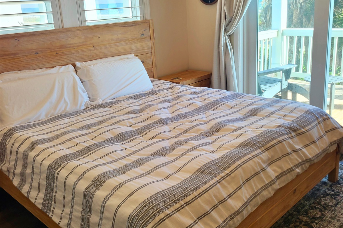 A warm light filled master bedroom