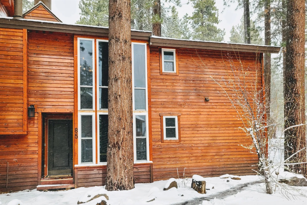 A peaceful winter welcome at Incline85, where fresh snow meets cozy mountain charm.