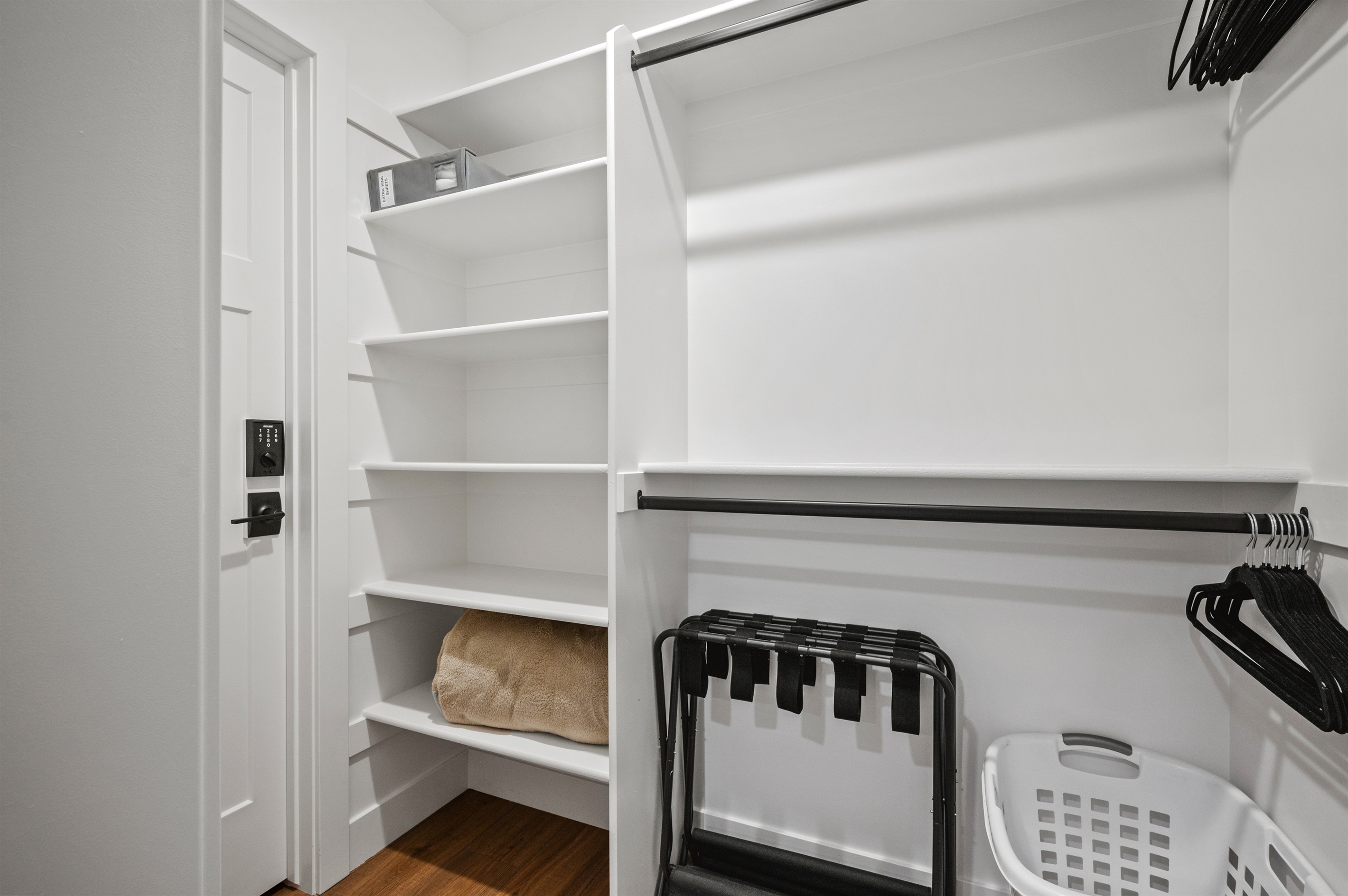 Walk-in closet for storing your clothing and travel essentials.