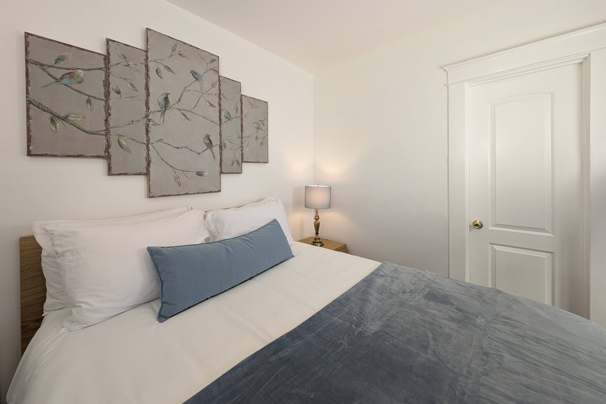Comfortable Queen bedroom with soft linens.