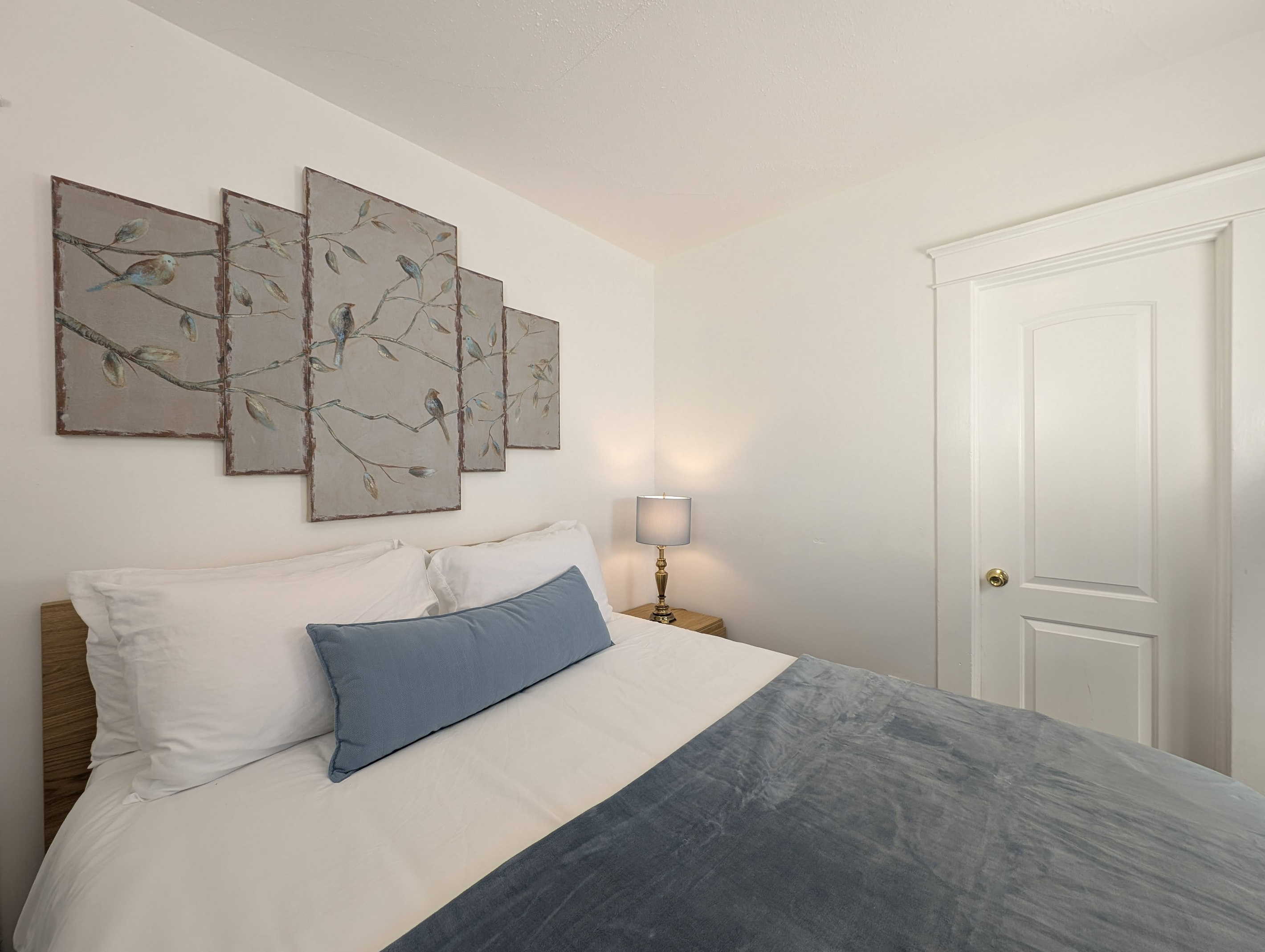 Comfortable Queen bedroom with soft linens.