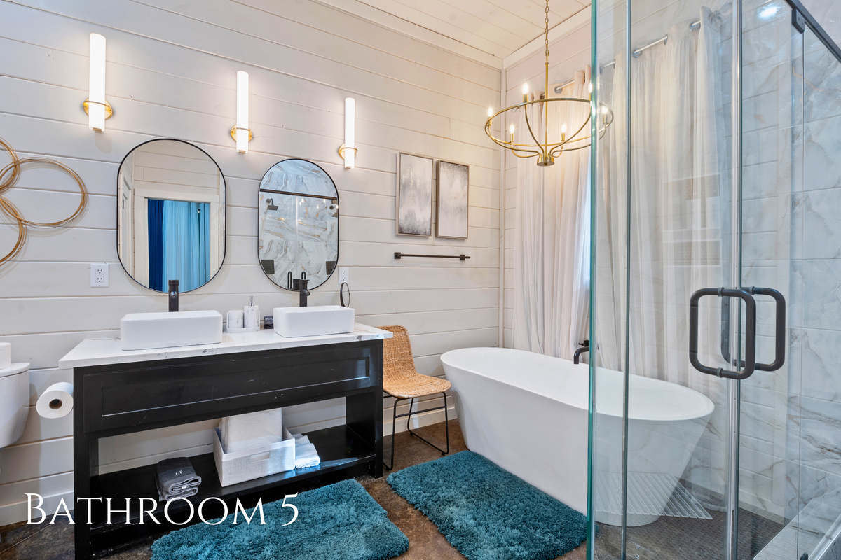 A freestanding soaking tub, oversized shower, and elegant finishes bring a touch of luxury to your daily routine.
