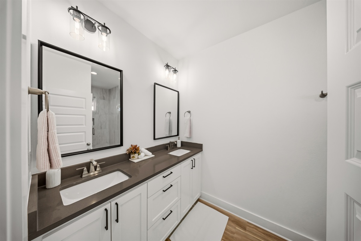 Upstairs primary bathroom with clean modern finishes.