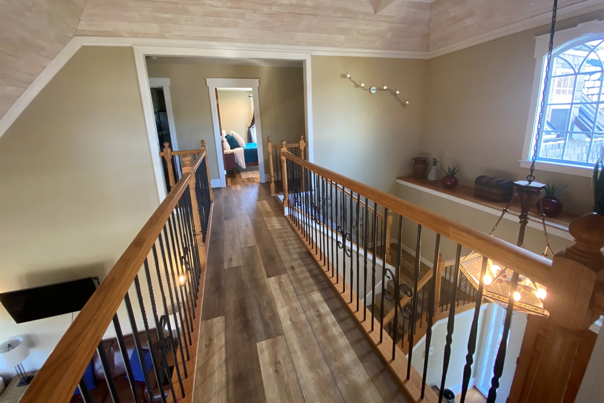 The room featuring the queen bed is separated from the other rooms, giving your guests an additional sense of privacy. 