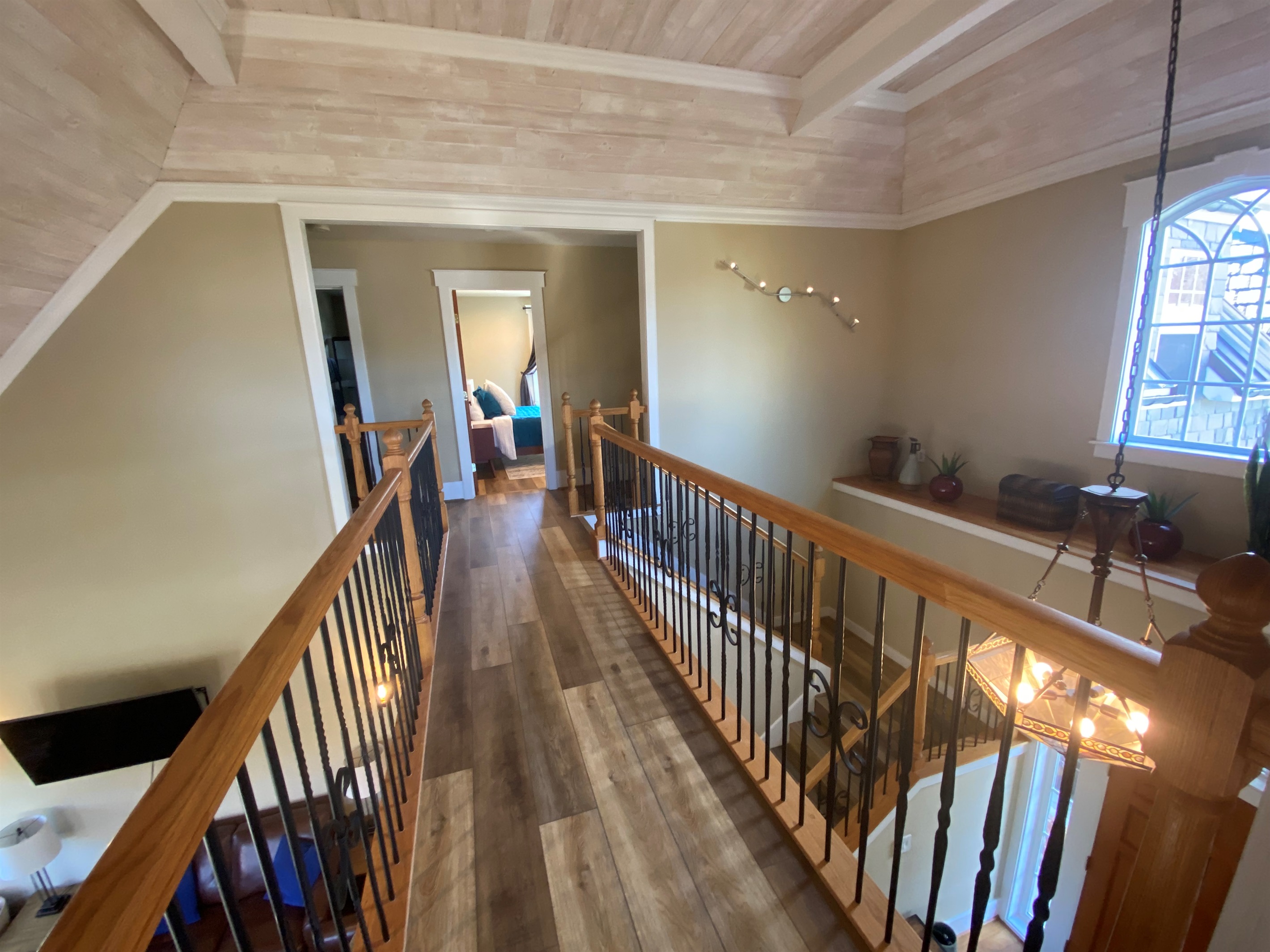 The room featuring the queen bed is separated from the other rooms, giving your guests an additional sense of privacy. 