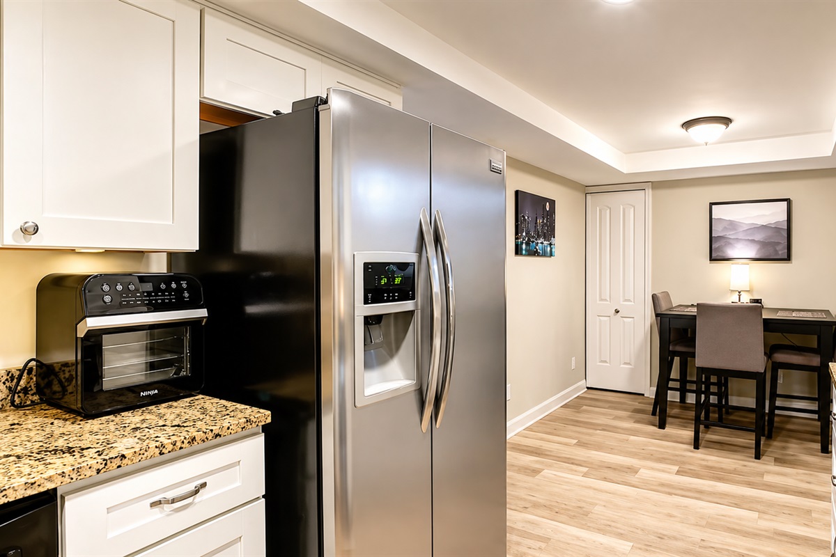Entrance - Open floor plan entry with view to dining and living areas