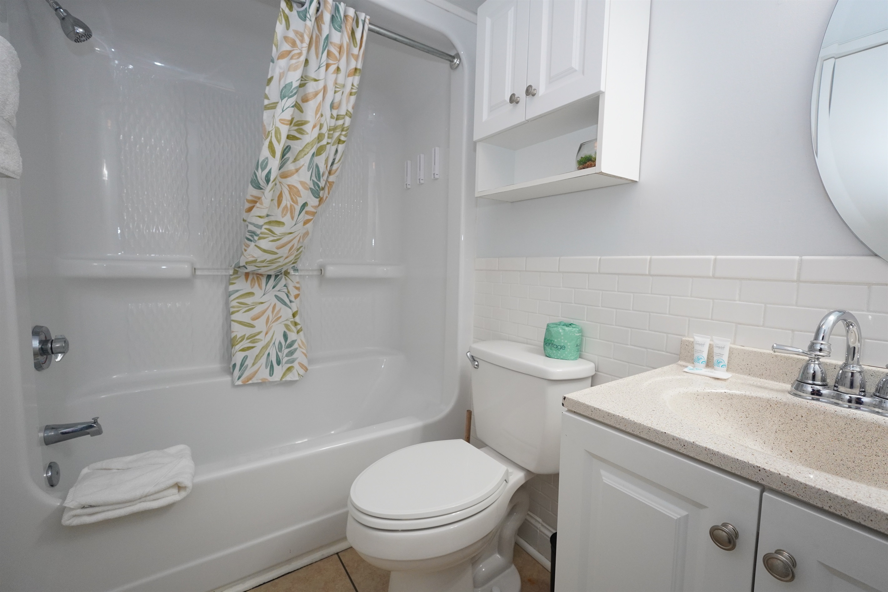 Sleek full bathroom with modern finishes