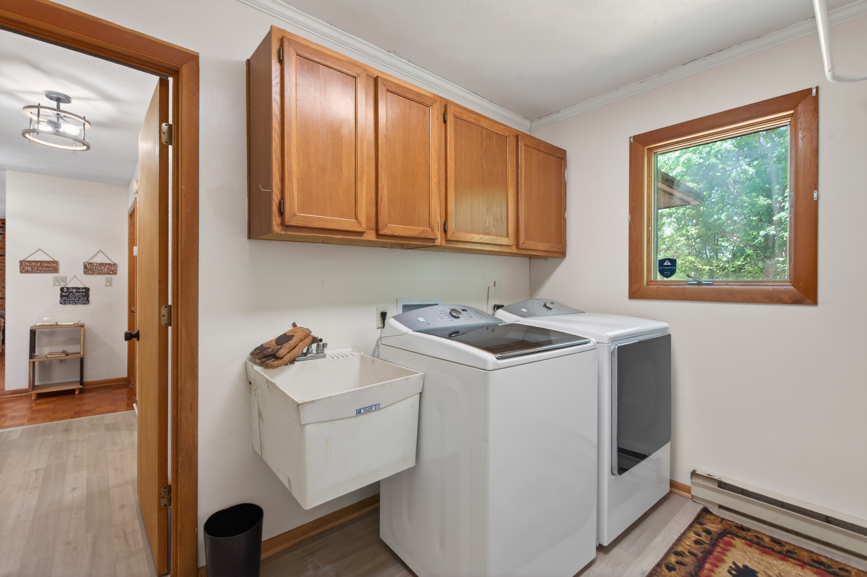 Laundry Room: Bright space with modern machines and a view, perfect for keeping your gear fresh!