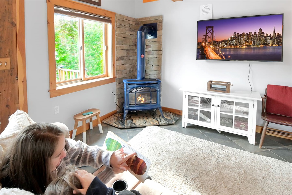 Kick back after a long night in these cozy recliners while soaking up the heat from the gas stove! 
