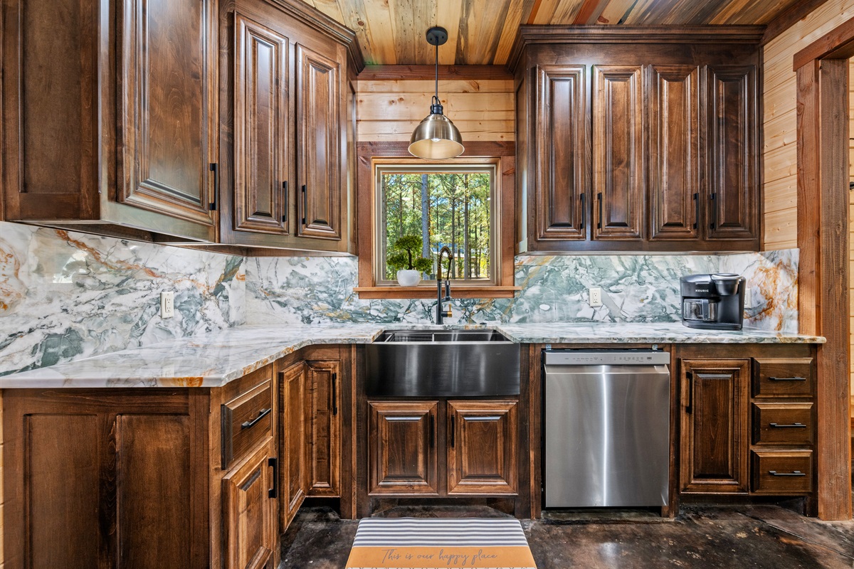 Modern kitchen with plenty of counter space and rustic style.