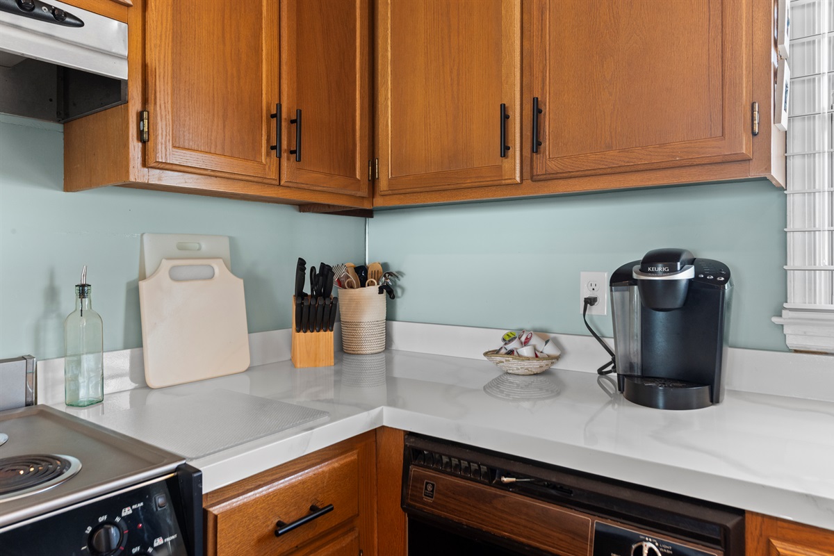 Kitchen: Sleek countertops and modern amenities, perfect for culinary adventures!