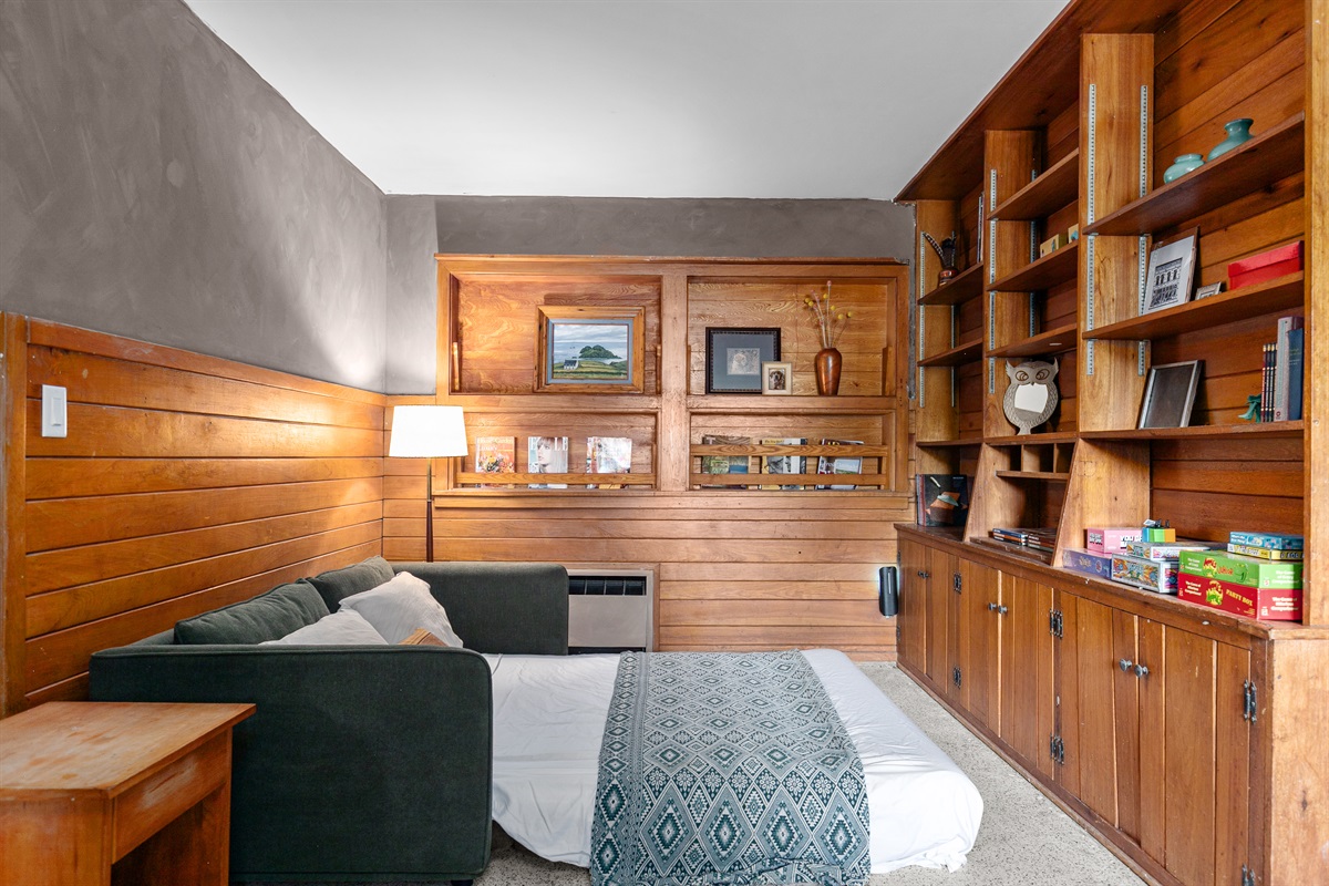The den offers a quiet place to get away — a cozy spot to unwind, catch up on work, or simply enjoy a little time to yourself.
