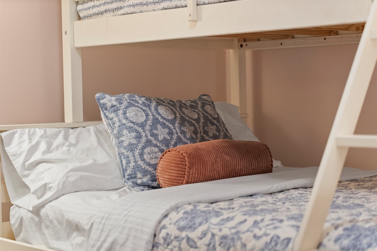 Kids bunkbed area with pillows.