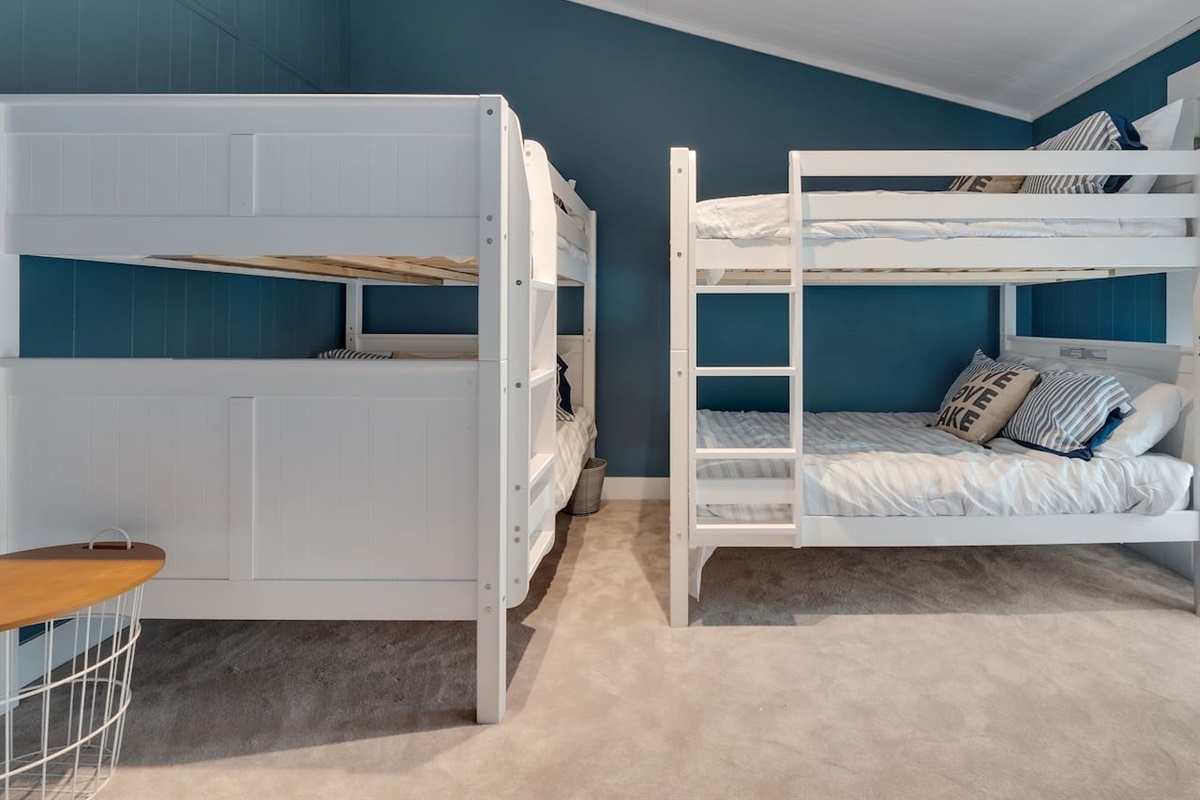 Upstairs, two full-over-full bunkbeds, plenty of space.  Patio over front yard.