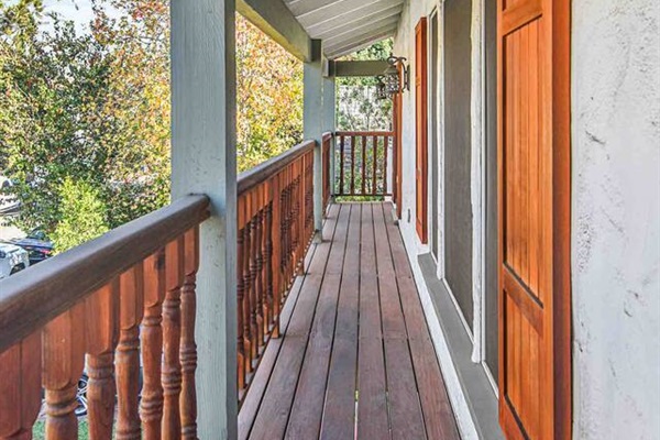 Front balcony, the first of three private terraces.