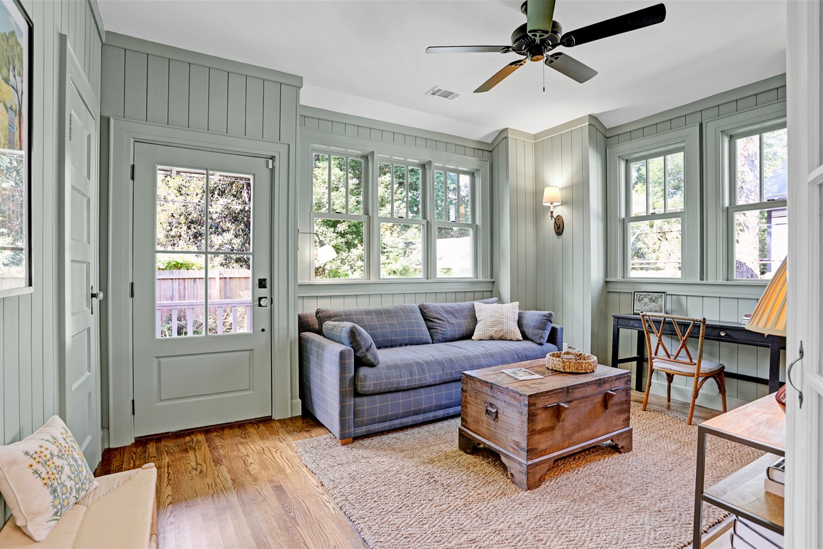 Tucked at the back of the home, this bright and breezy space is perfect for relaxing or enjoying the backyard views.