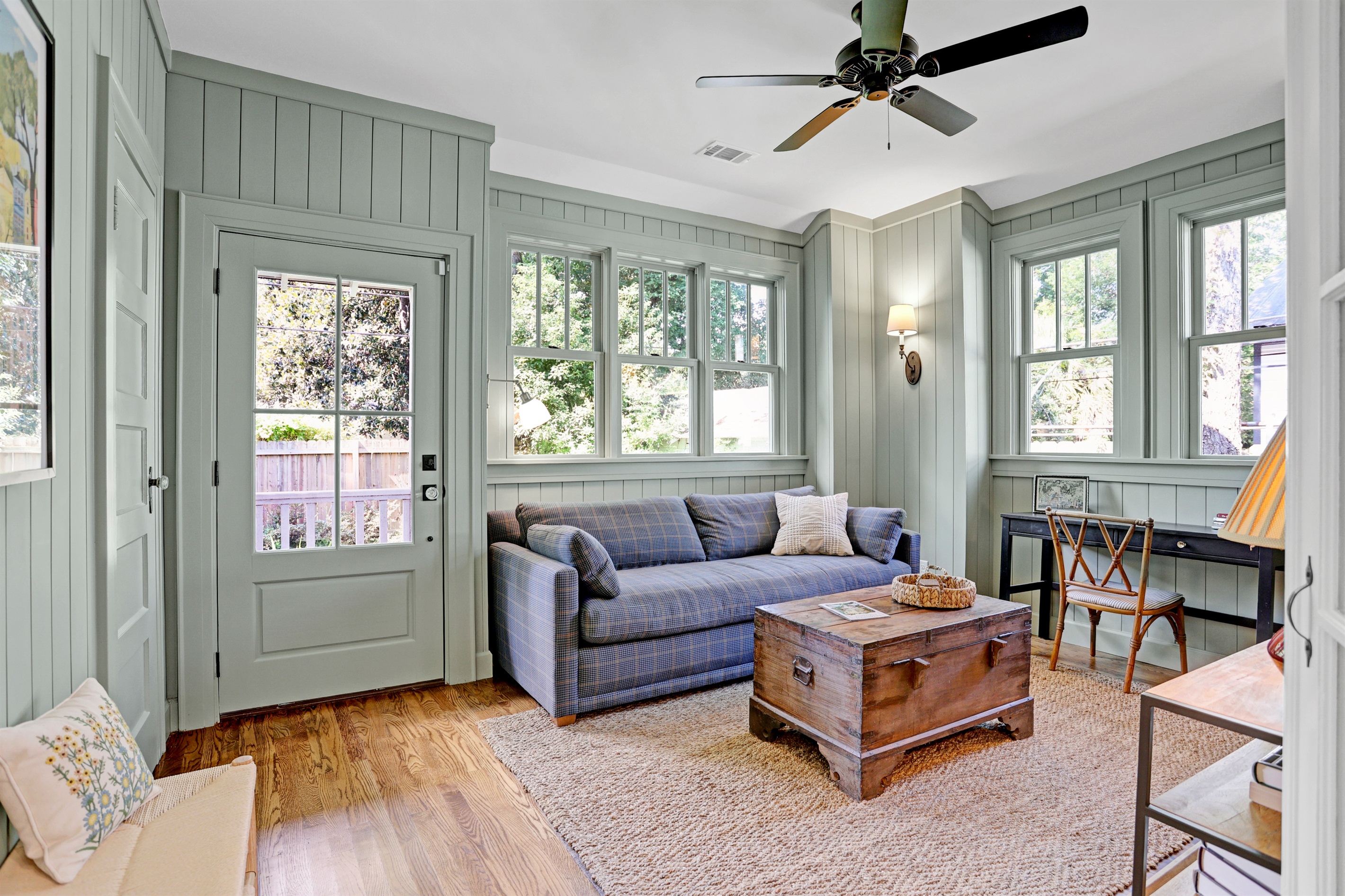 Tucked at the back of the home, this bright and breezy space is perfect for relaxing or enjoying the backyard views.