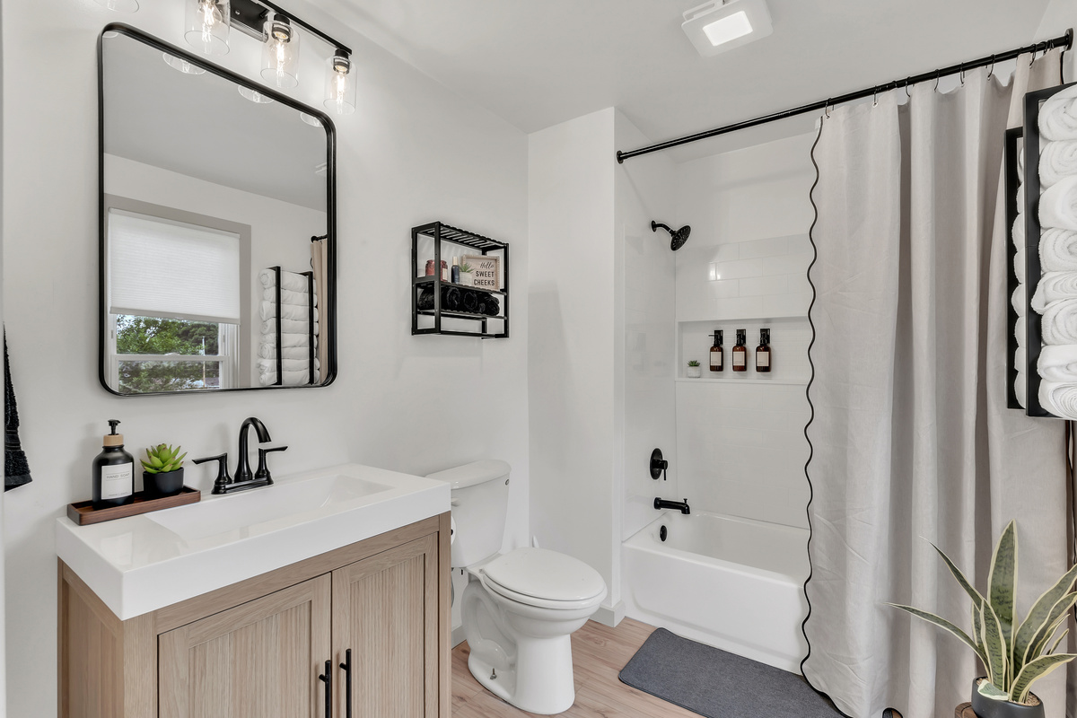 Spa-inspired and fully renovated Full bathroom. with all stocked essentials - shampoo, conditioner, body wash and toilet paper. 