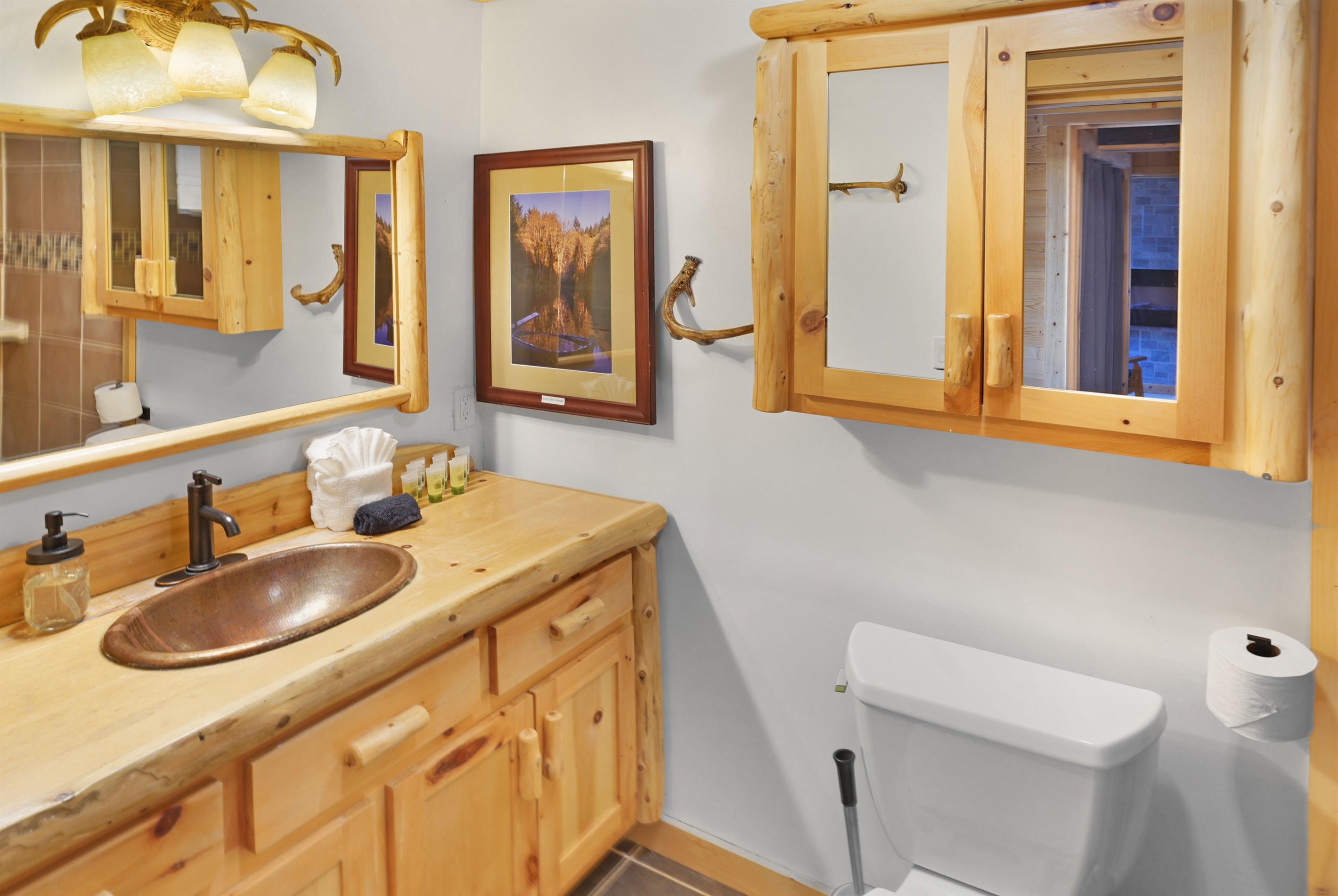 Updated bathroom with rustic cabin finishes