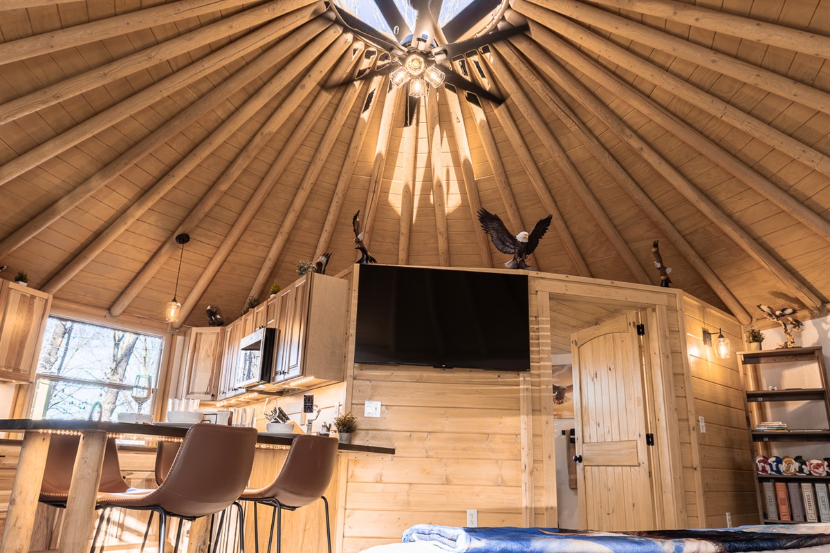 Soaring dome ceiling with skylight and open-concept living below