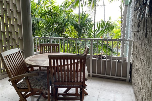 Private lanai surrounded by tropical greenery — ideal for morning coffee or evening relaxation.